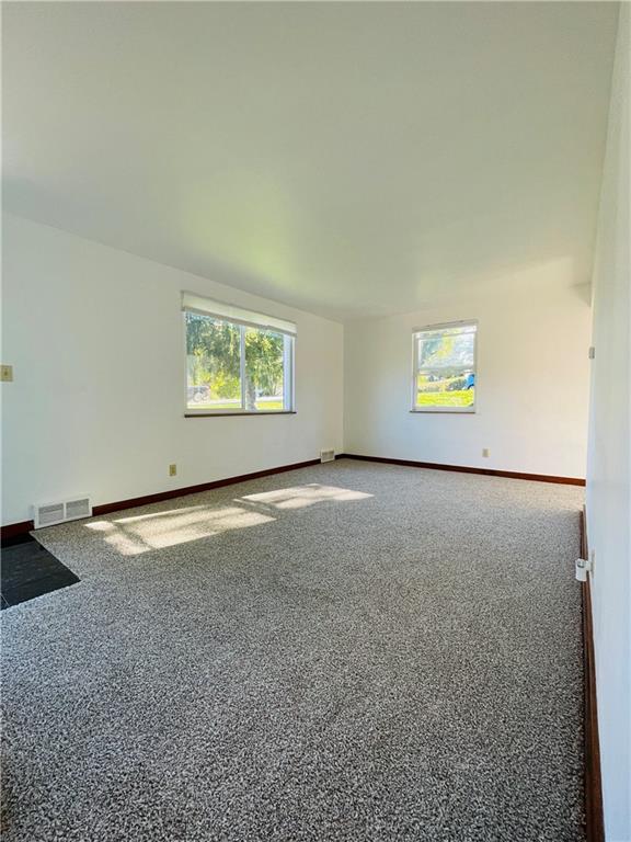 8149 Peebles Road Pittsburgh, PA 15237 - Photo 16 of 36 an empty room with windows
