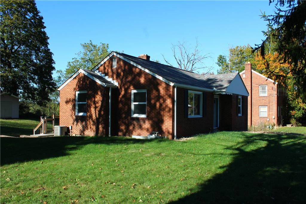 8149 Peebles Road Pittsburgh, PA 15237 - Photo 2 of 36 a view of a house with yard and a garden