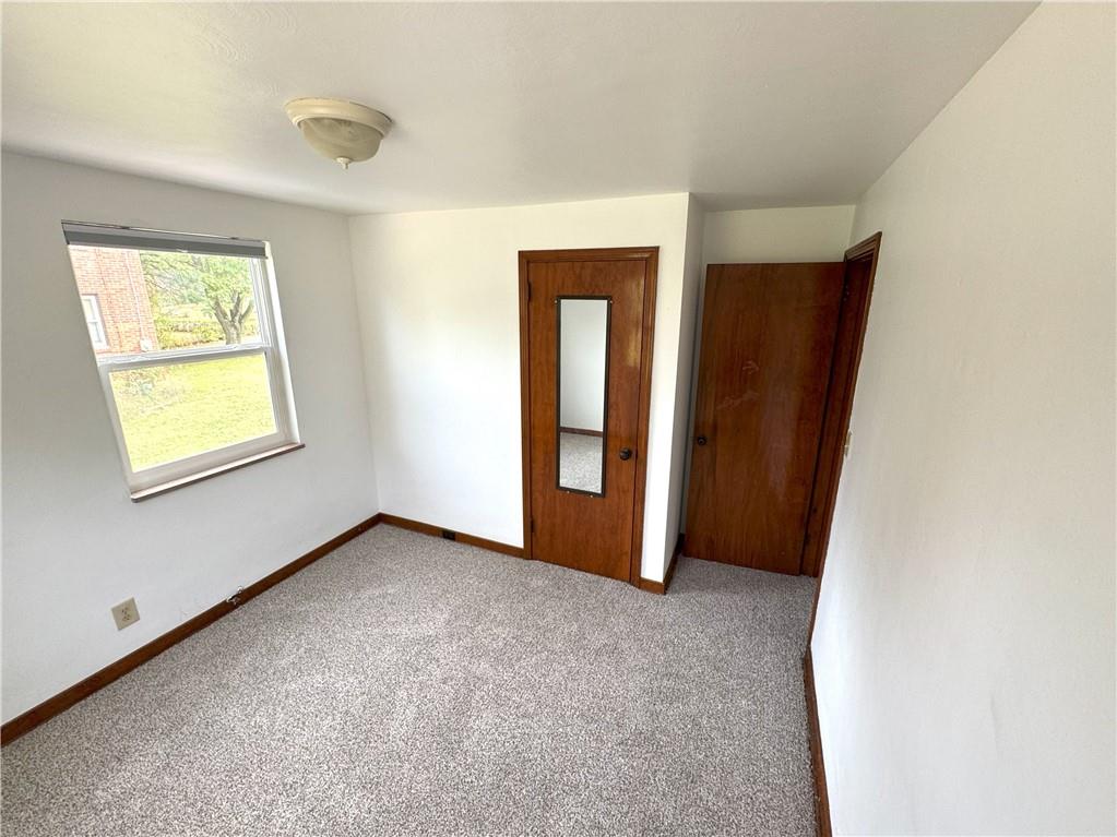 8149 Peebles Road Pittsburgh, PA 15237 - Photo 23 of 36 an empty room with windows
