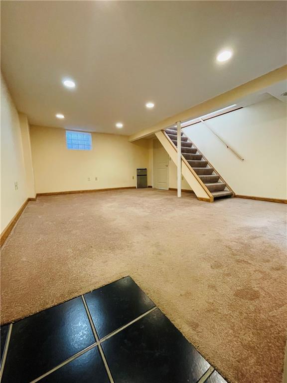 8149 Peebles Road Pittsburgh, PA 15237 - Photo 29 of 36 an empty room with wooden floor