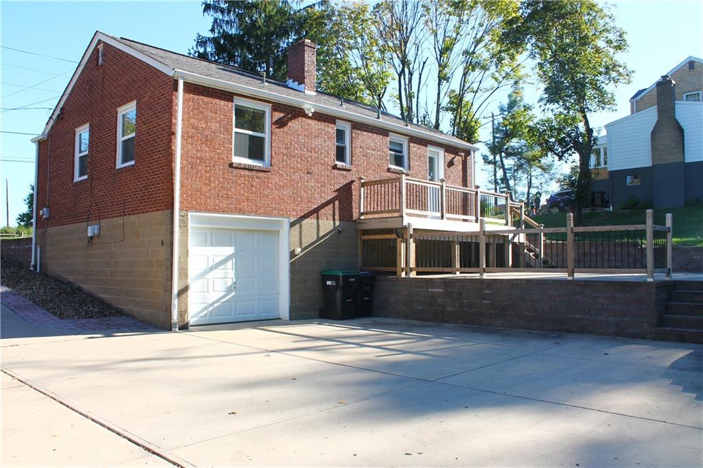 8149 Peebles Road Pittsburgh, PA 15237 - Photo 5 of 36 a view of a house with a yard