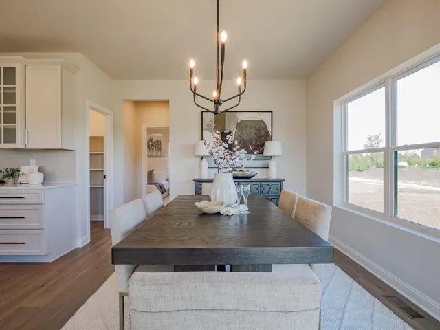 a dining table with a rug