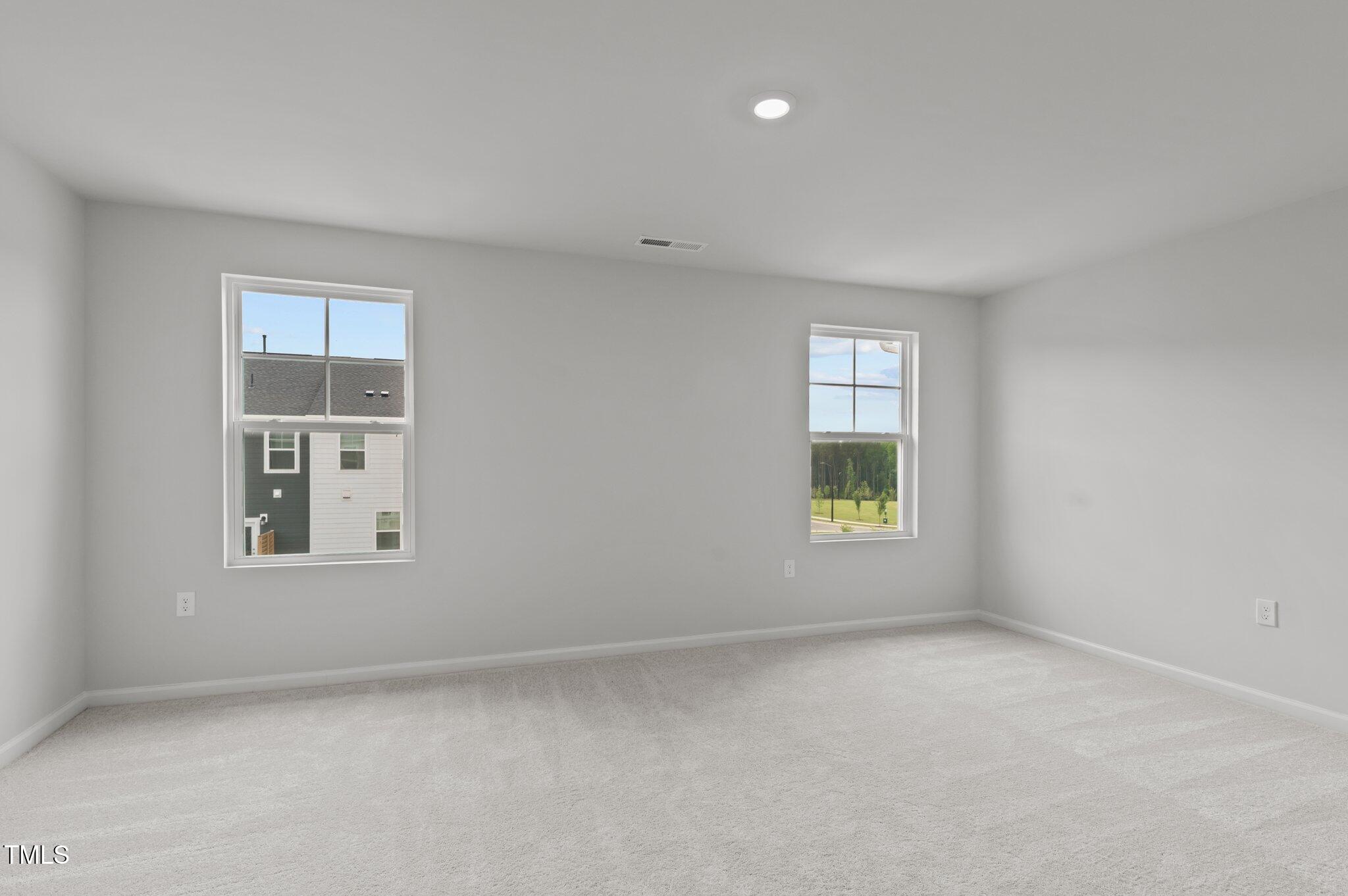 Undisclosed Address Wake Forest, NC 27587 - Photo 28 of 35 an empty room with windows