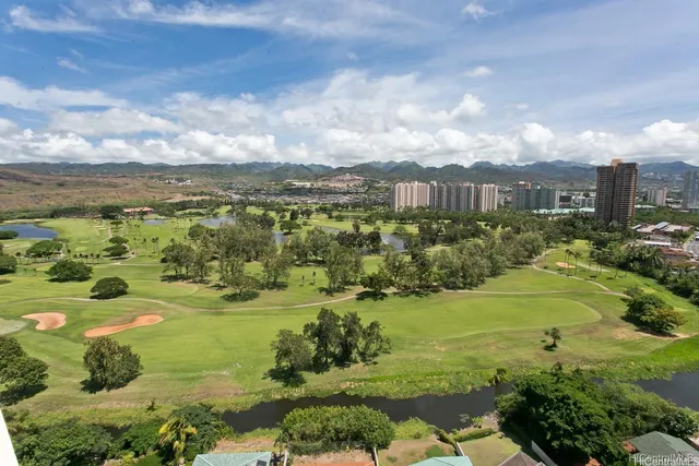 a view of a garden with an ocean