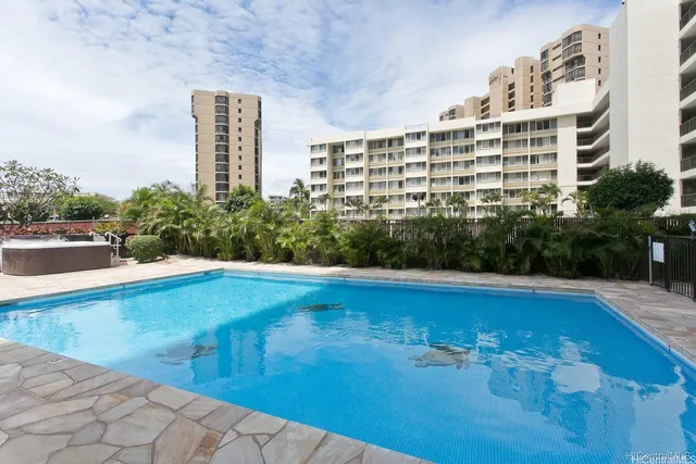 a view of a swimming pool with an outdoor space