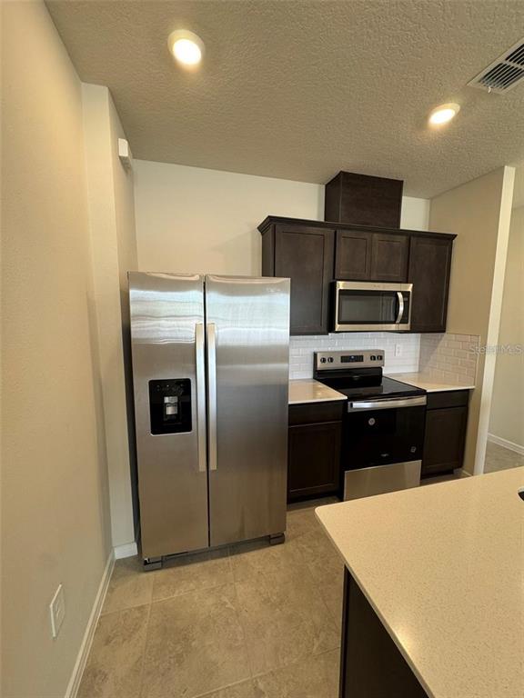 2025 Calm Soul Way Kissimmee, FL 34744 - Photo 11 of 32