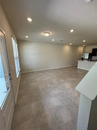 a view of hallway with a window