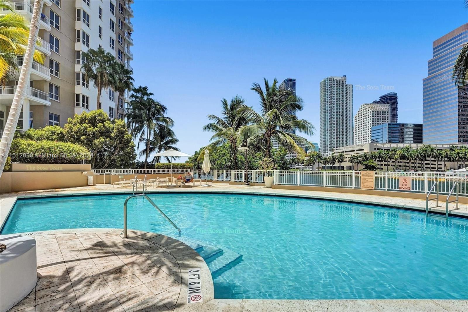 801 Brickell Key Boulevard, Unit 3004 Miami, FL 33131 - Photo 17 of 33 a view of a swimming pool and an outdoor space