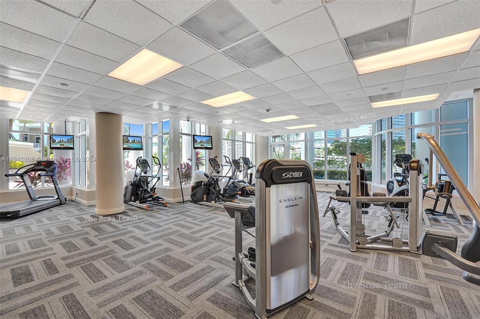 801 Brickell Key Boulevard, Unit 3004 Miami, FL 33131 - Photo 20 of 33 a view of a room with gym equipment