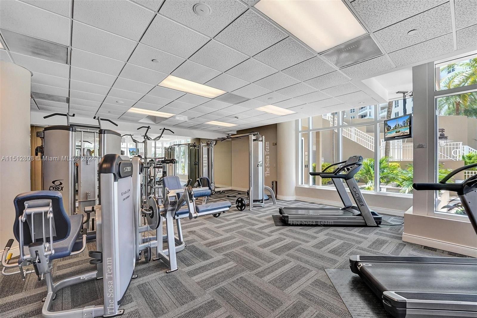 801 Brickell Key Boulevard, Unit 3004 Miami, FL 33131 - Photo 22 of 33 a view of a room with gym equipment