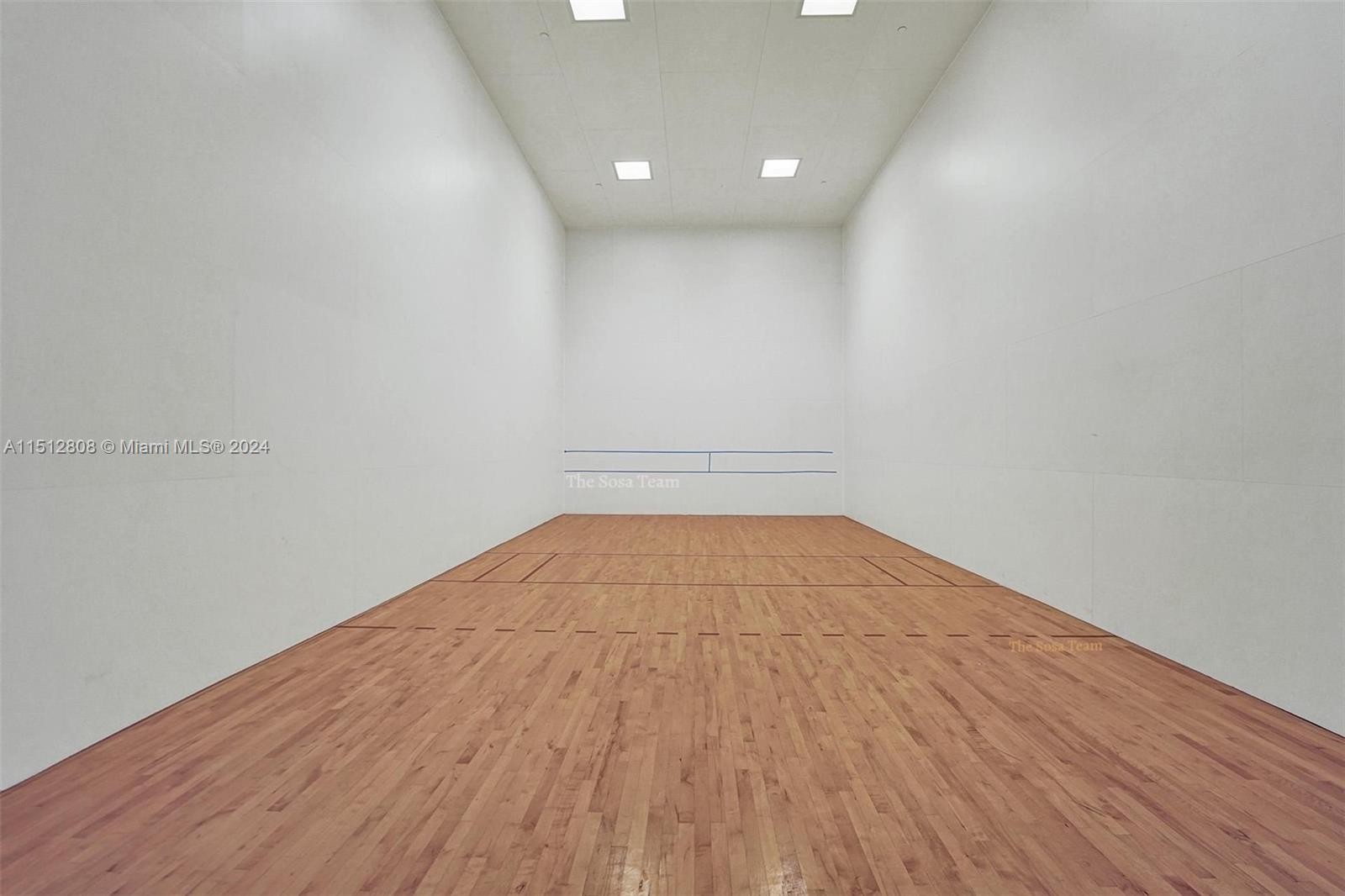 801 Brickell Key Boulevard, Unit 3004 Miami, FL 33131 - Photo 25 of 33 a view of empty room with wooden floor