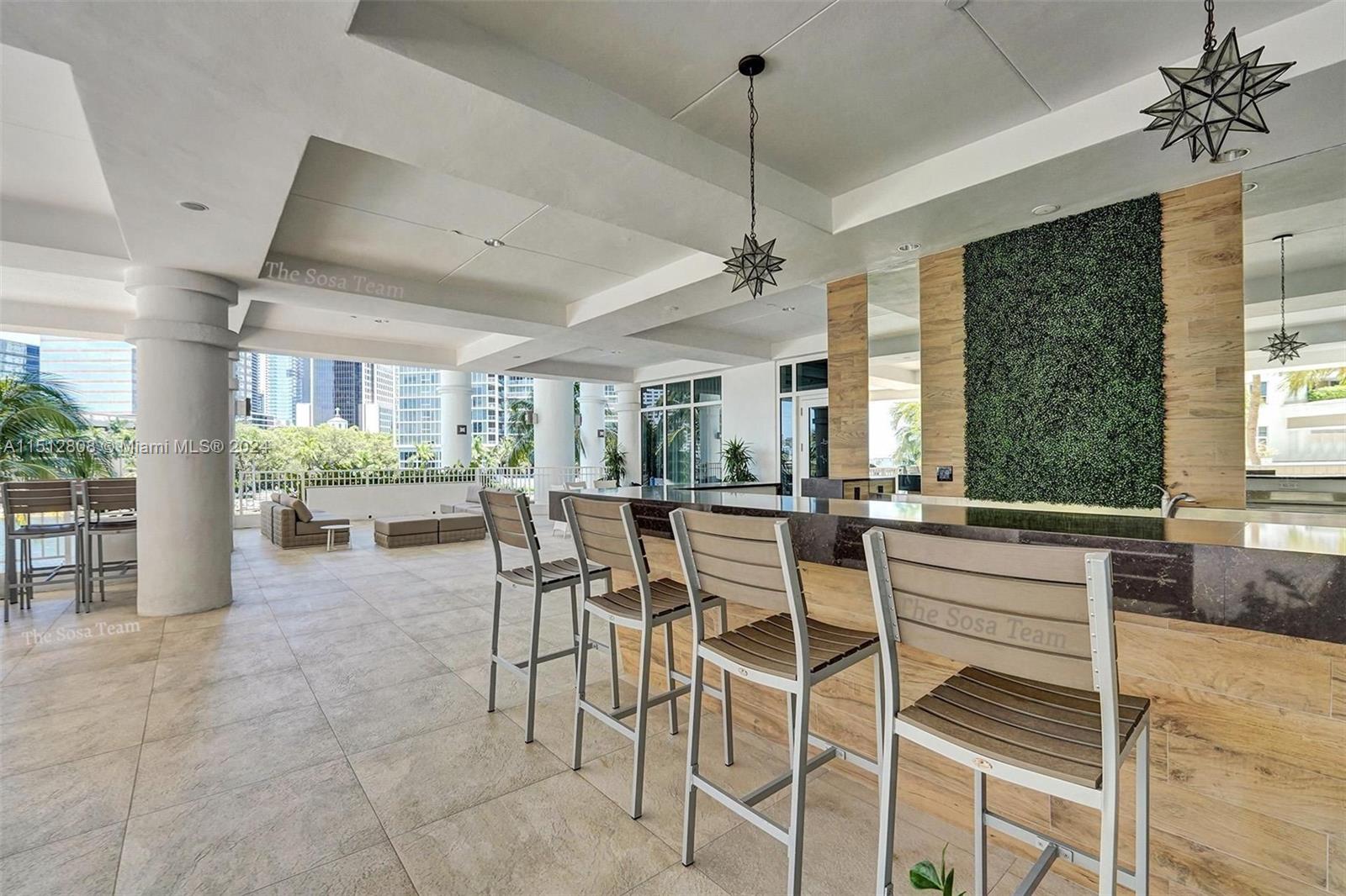 801 Brickell Key Boulevard, Unit 3004 Miami, FL 33131 - Photo 26 of 33 a view of a dining room with furniture window and outside view