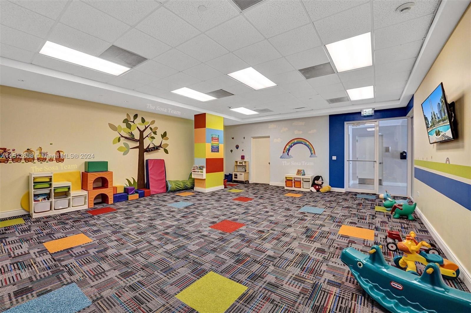 801 Brickell Key Boulevard, Unit 3004 Miami, FL 33131 - Photo 28 of 33 a bedroom with furniture and a flat screen tv