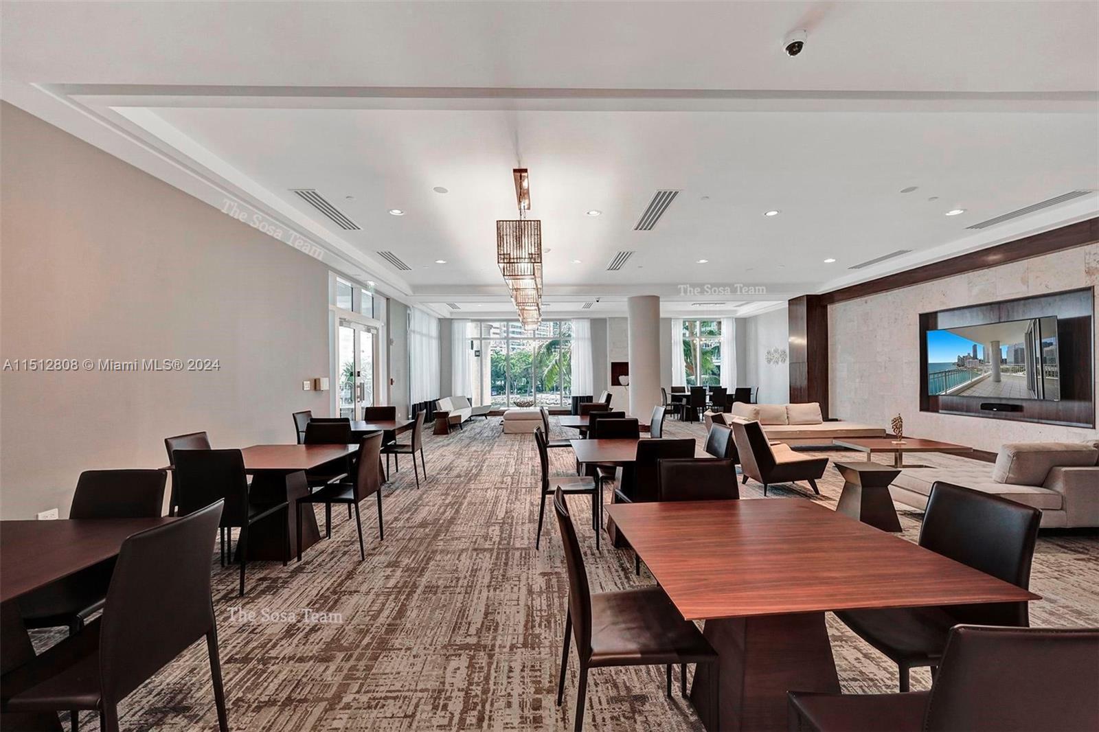 801 Brickell Key Boulevard, Unit 3004 Miami, FL 33131 - Photo 29 of 33 a view of a dining area with furniture