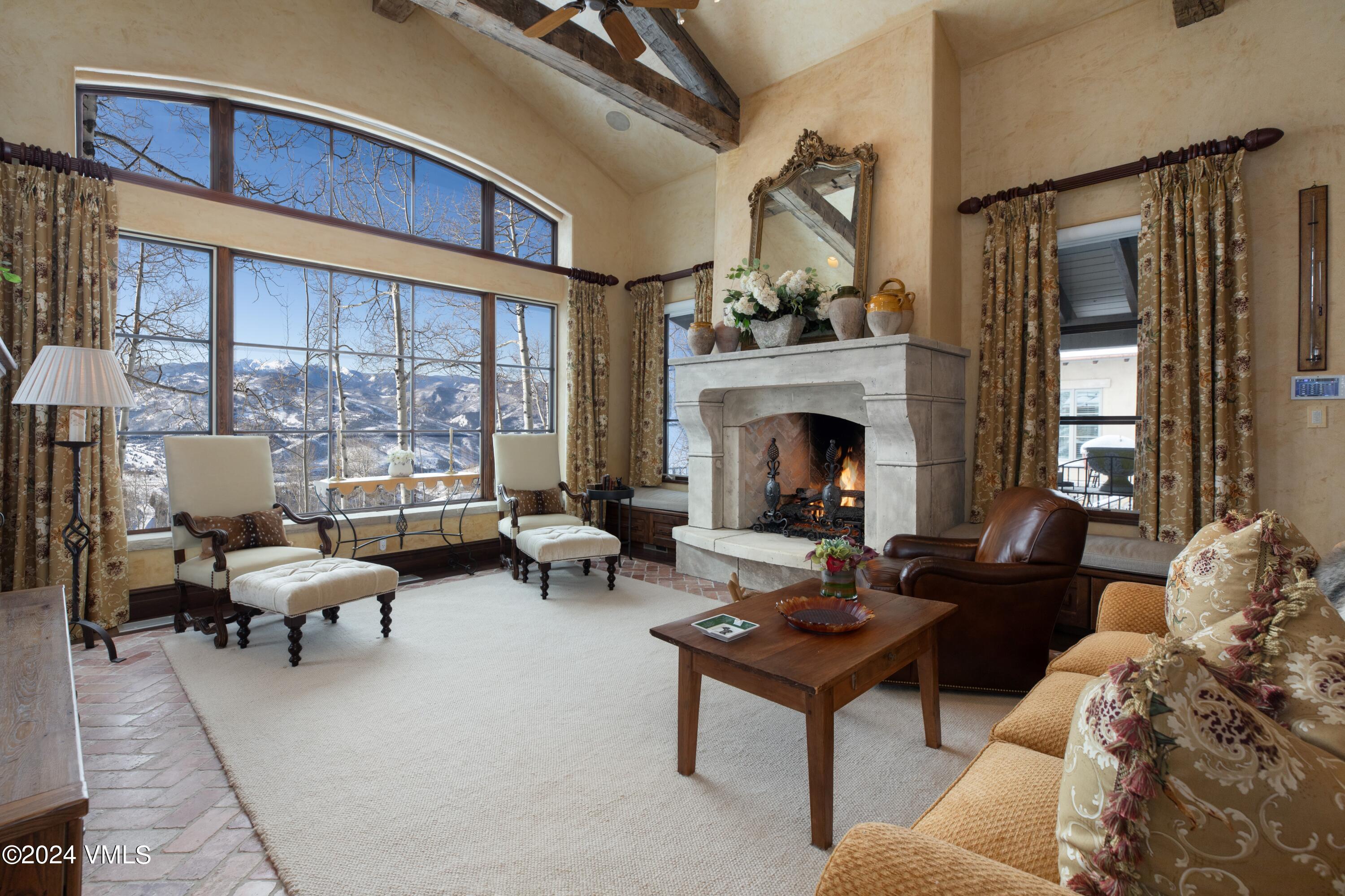 44 Jasmine Avon, CO 81620 - Photo 3 of 41 a living room with furniture and a fireplace