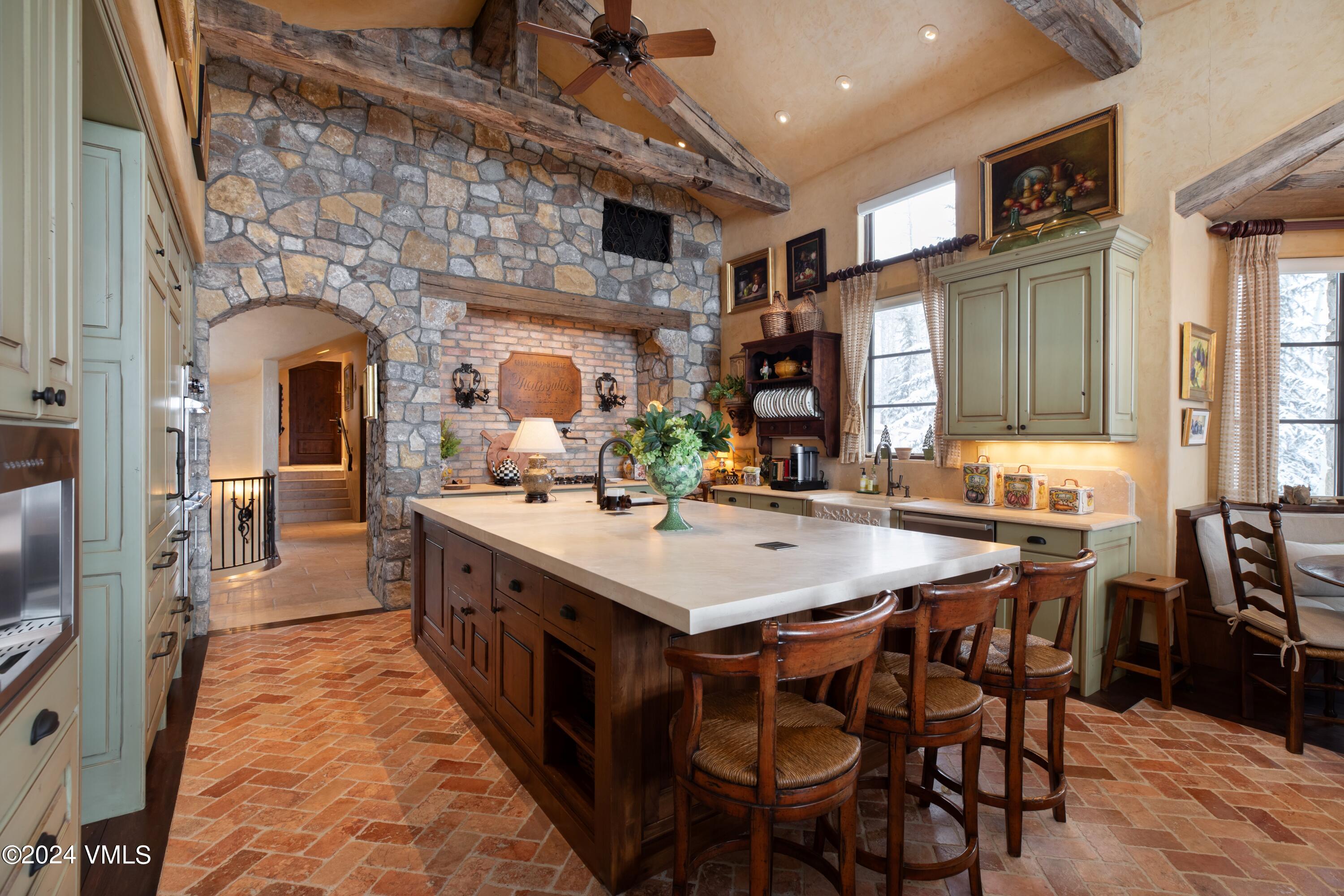 44 Jasmine Avon, CO 81620 - Photo 10 of 41 a large kitchen with a table and chairs