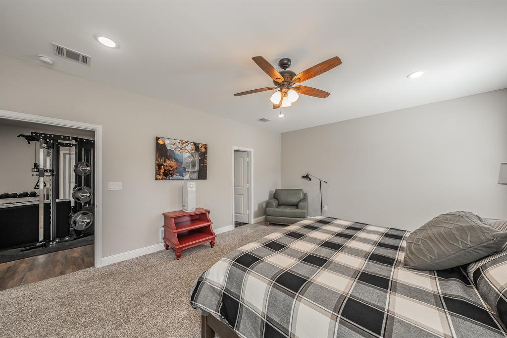 117 Rock Salt Drive Springtown, TX 76082 - Photo 18 of 38 Carpeted room with recessed lighting and a ceiling fan