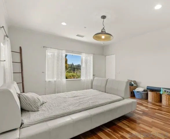 a bathroom with a granite countertop tub a double vanity and a sink