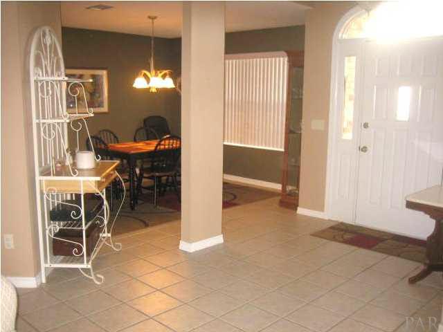 FOYER LOOKING INTO DINING ROOM