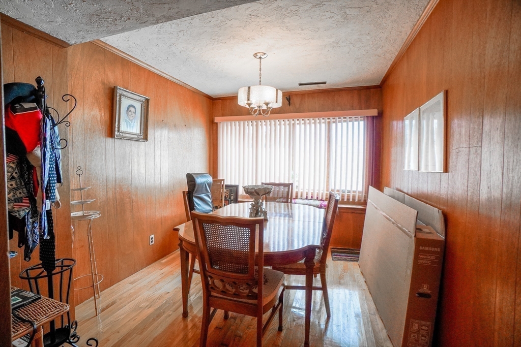 53 Yale Road Needham, MA 02494 - Photo 9 of 21 a view of a dining room with furniture window and wooden floor