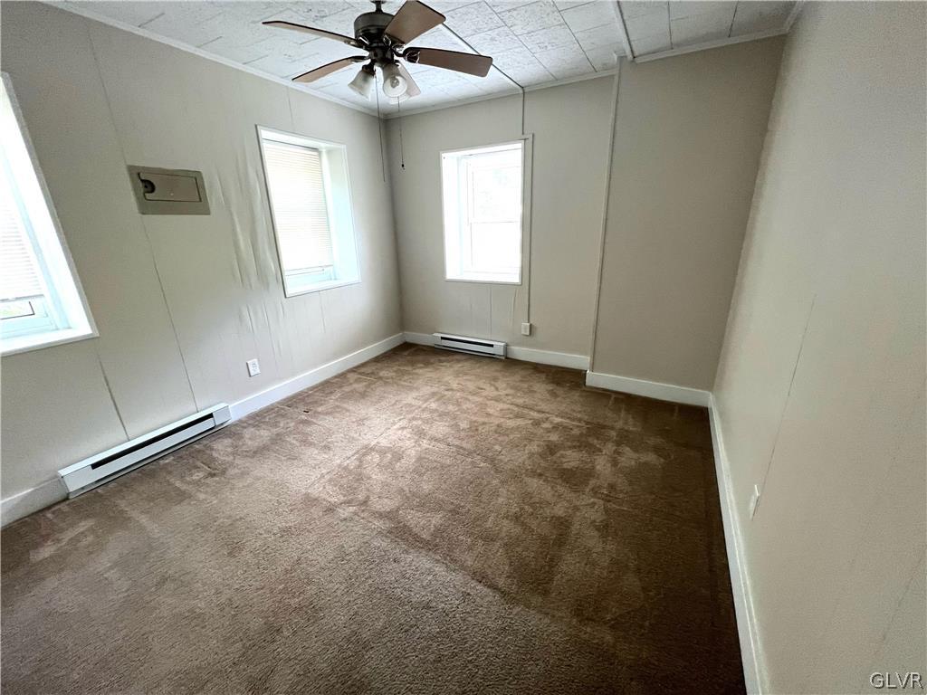 4001 Indian Creek Road Emmaus, PA 18049 - Photo 15 of 21 an empty room with windows and fan