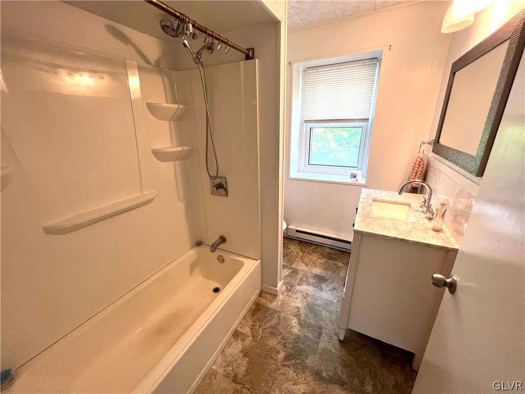 4001 Indian Creek Road Emmaus, PA 18049 - Photo 8 of 21 a bathroom with a tub sink and mirror