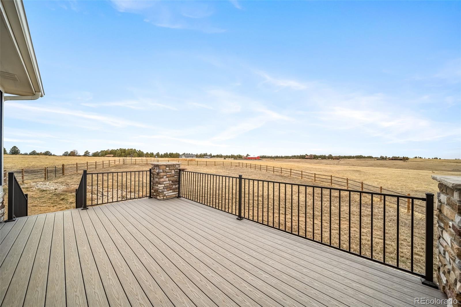 240 High Meadows Loop Elizabeth, CO 80107 - Photo 26 of 50 a view of a terrace with outdoor seating