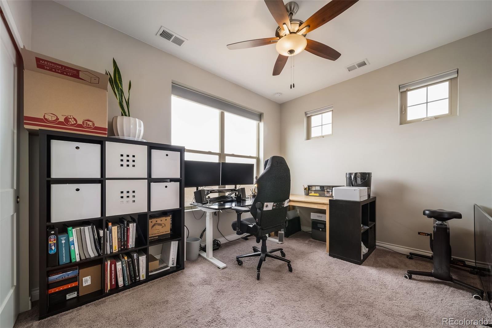 240 High Meadows Loop Elizabeth, CO 80107 - Photo 40 of 50 a view of a workspace with furniture and a window