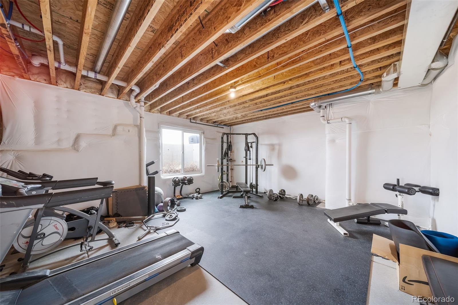 240 High Meadows Loop Elizabeth, CO 80107 - Photo 42 of 50 a room with gym equipment