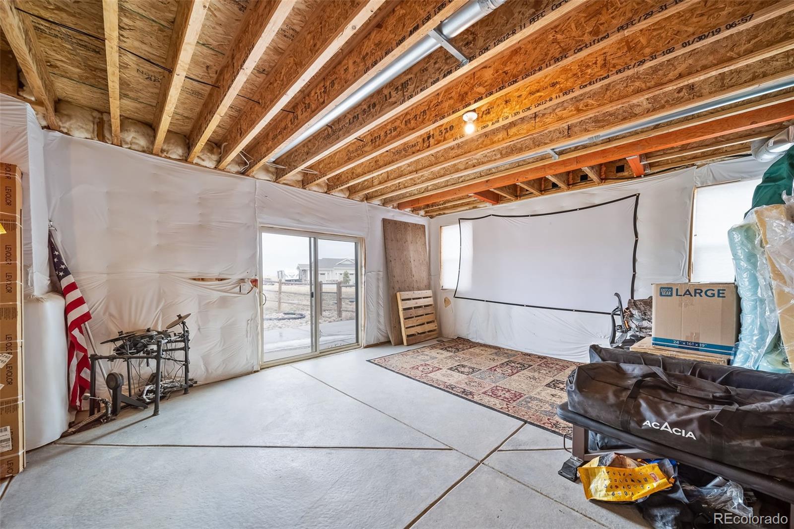 240 High Meadows Loop Elizabeth, CO 80107 - Photo 43 of 50 a kitchen with furniture and a stove