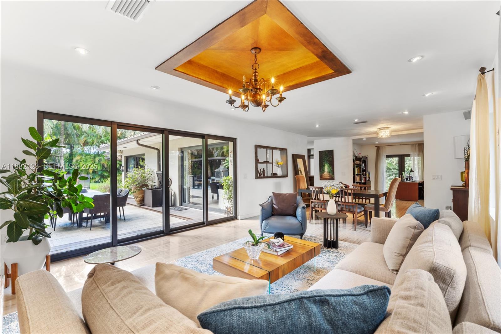 560 Sabal Palm Road Miami, FL 33137 - Photo 2 of 15 a living room with furniture and a large window