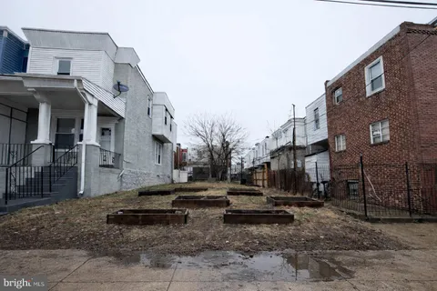 a row of residential houses with outdoor space