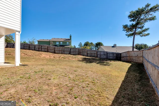a swimming pool with a yard