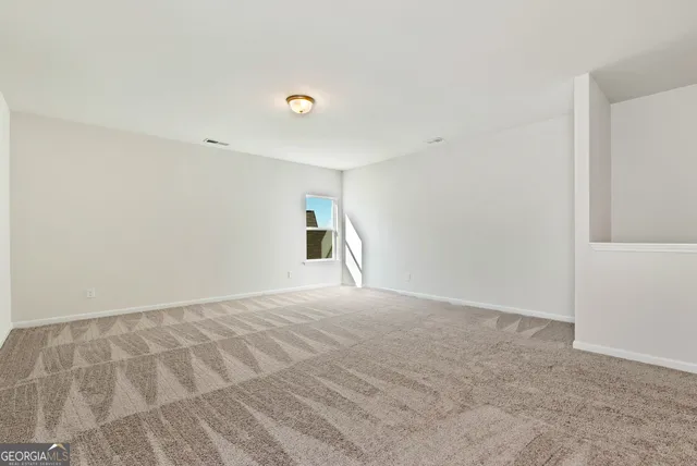 a bathroom with a granite countertop sink a toilet and bathtub