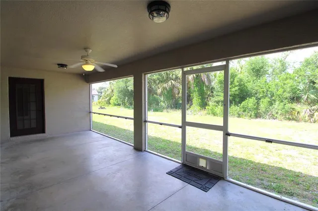 an empty room with sliding door