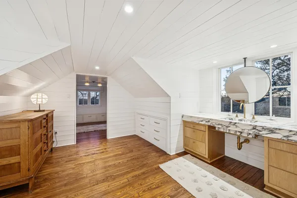 a large kitchen with a stove top oven