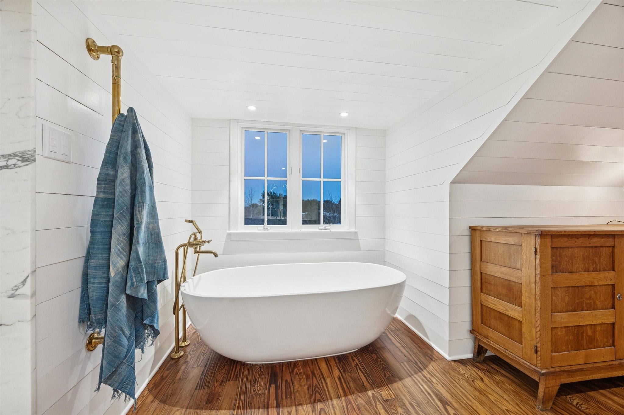 6389 Miller Road New Ulm, TX 78950 - Photo 16 of 49 a spacious bathroom with a bathtub and window
