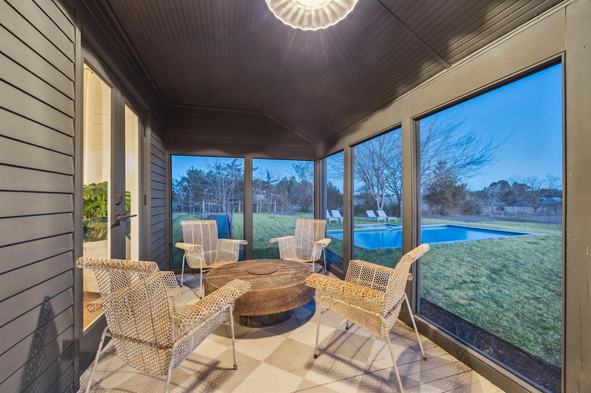 6389 Miller Road New Ulm, TX 78950 - Photo 21 of 49 a bedroom with furniture and large windows