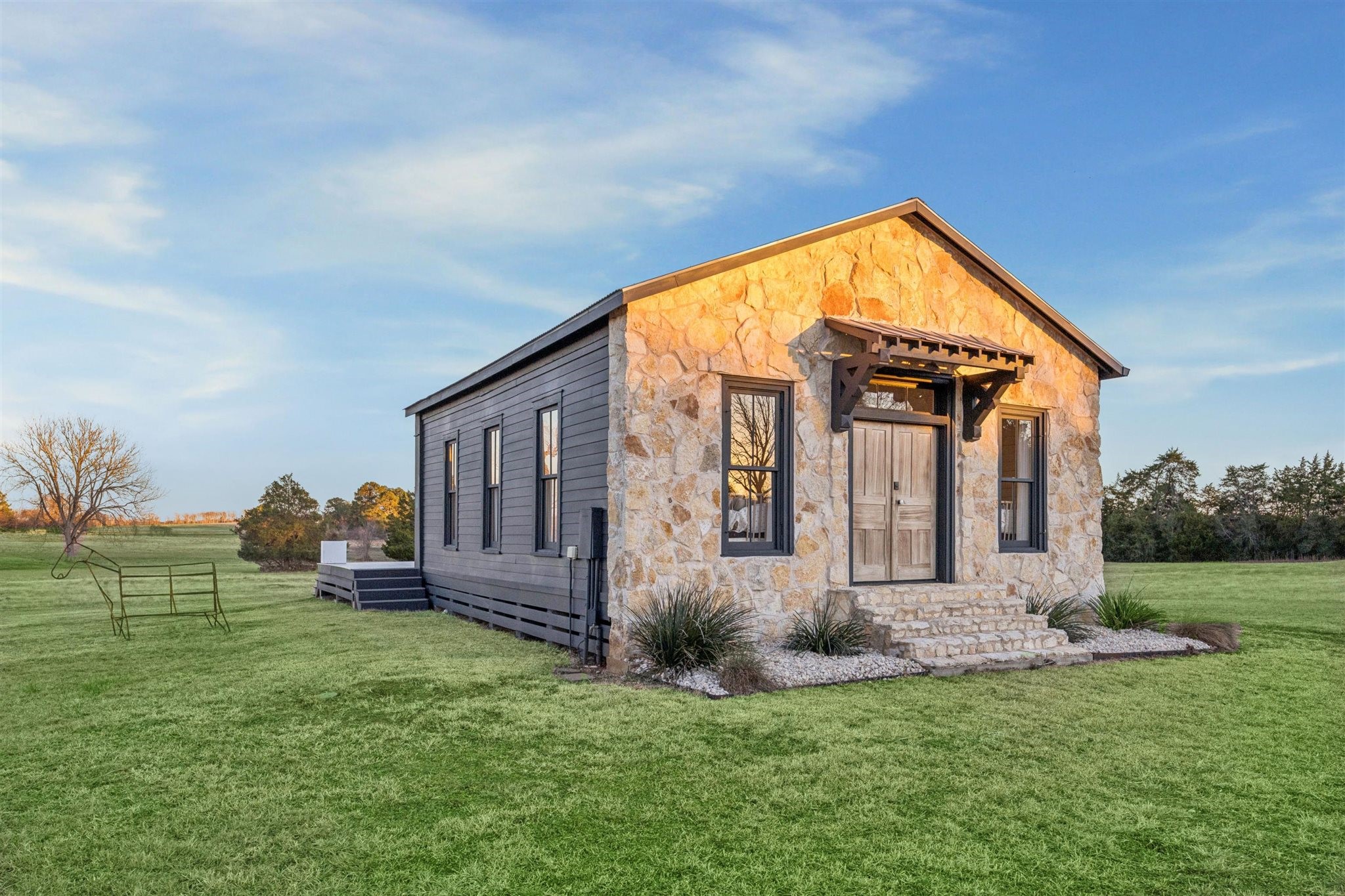 6389 Miller Road New Ulm, TX 78950 - Photo 27 of 49 a view of a house with backyard and porch