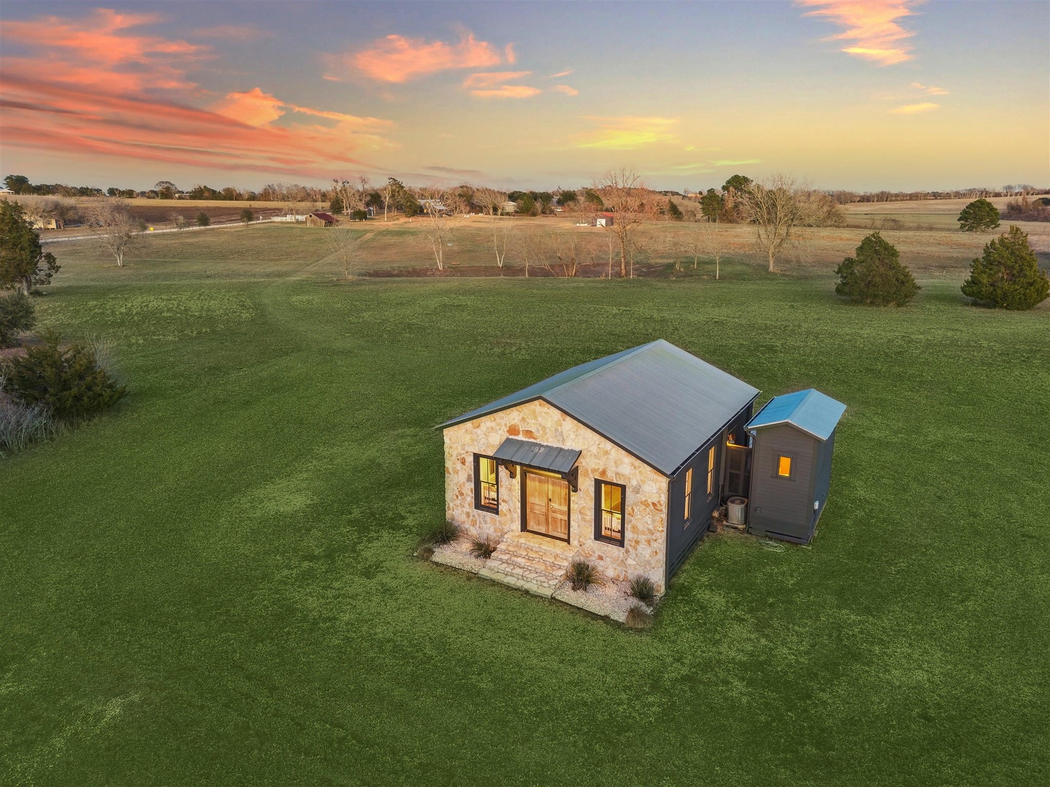 6389 Miller Road New Ulm, TX 78950 - Photo 28 of 49 a view of a house with a yard