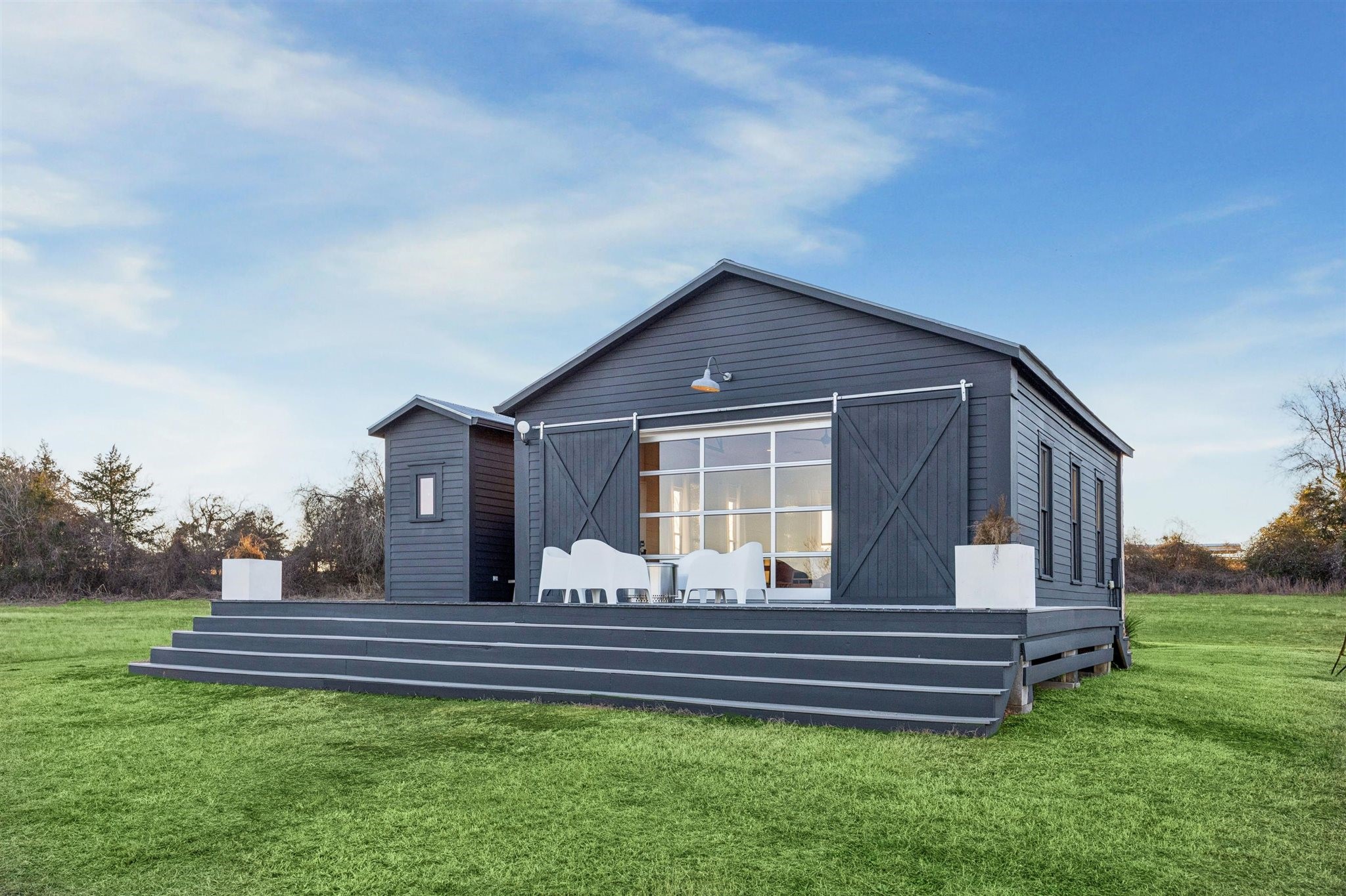 6389 Miller Road New Ulm, TX 78950 - Photo 35 of 49 a front view of a house with garden