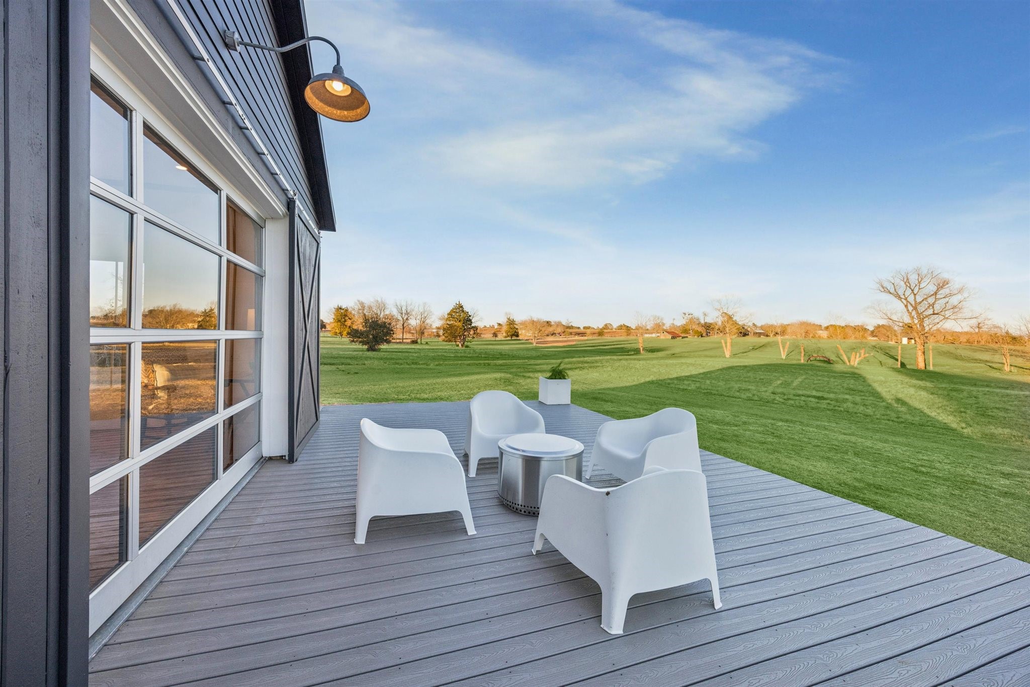 6389 Miller Road New Ulm, TX 78950 - Photo 36 of 49 a view of a chairs in patio of the house