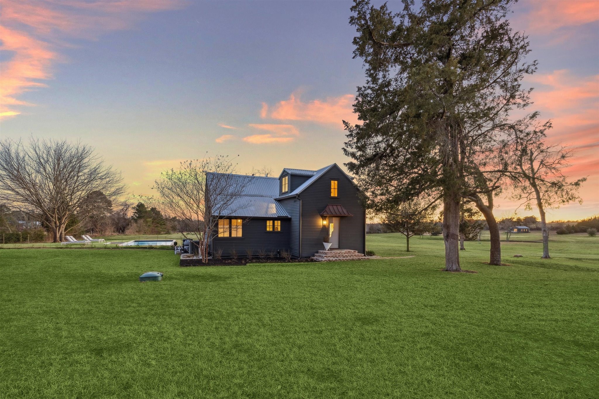 6389 Miller Road New Ulm, TX 78950 - Photo 40 of 49 a brick building with trees in front of it