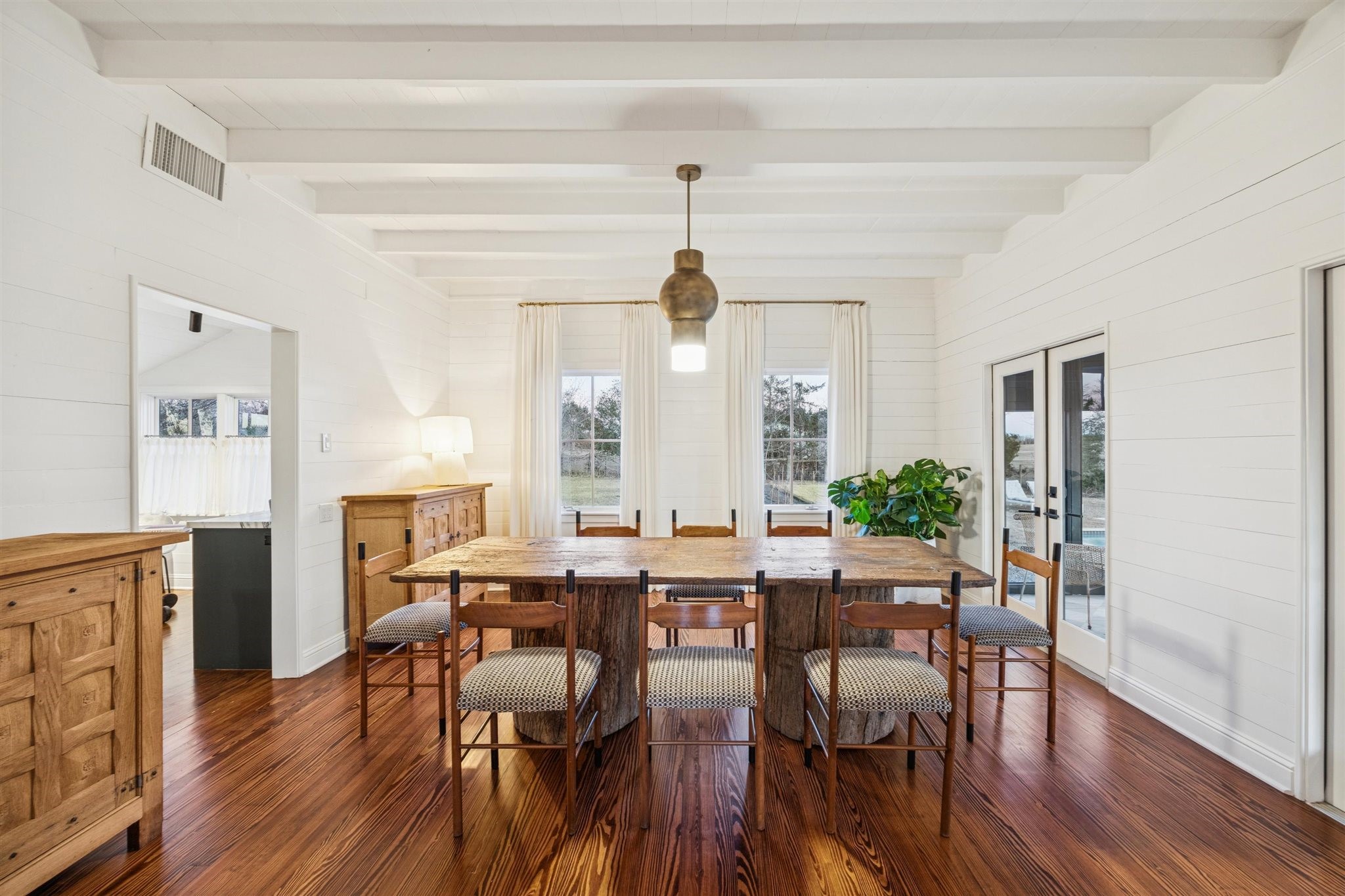 6389 Miller Road New Ulm, TX 78950 - Photo 7 of 49 a view of a dining room with furniture window and wooden floor