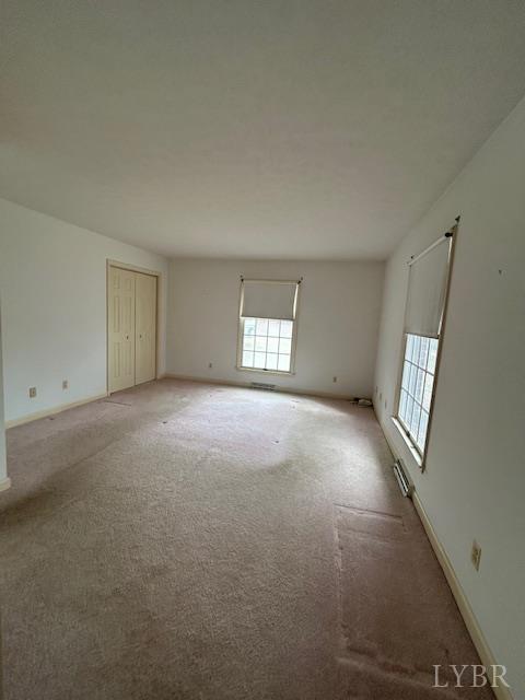 116 Vista Drive Amherst, VA 24521 - Photo 7 of 21 a view of empty room with windows