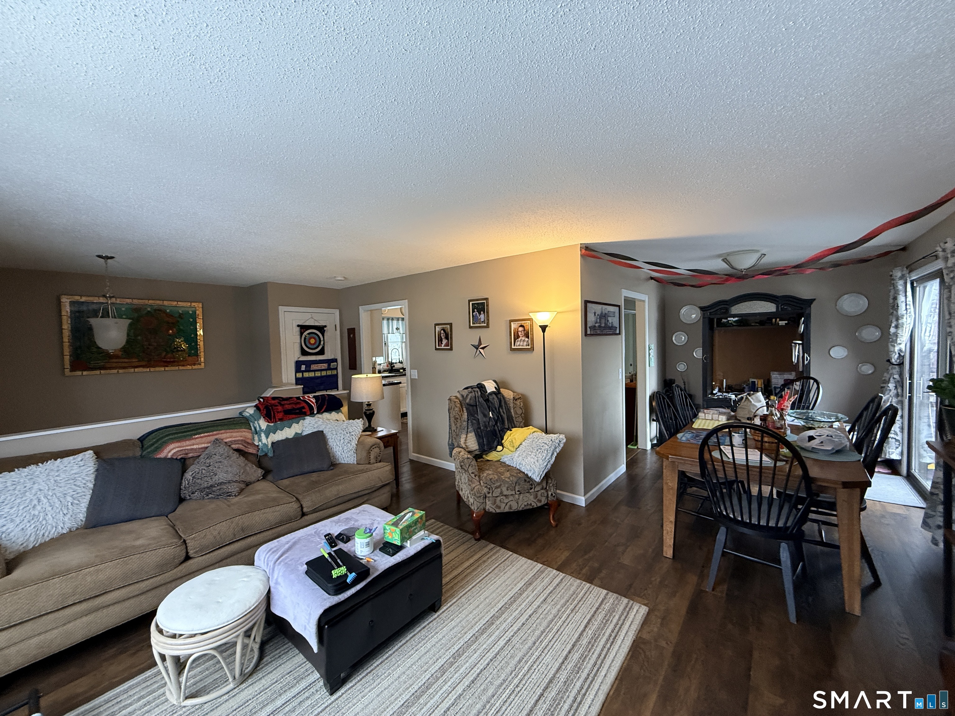 44 Lewis Street Winchester, CT 06098 - Photo 12 of 25 a living room with furniture and a wooden floor