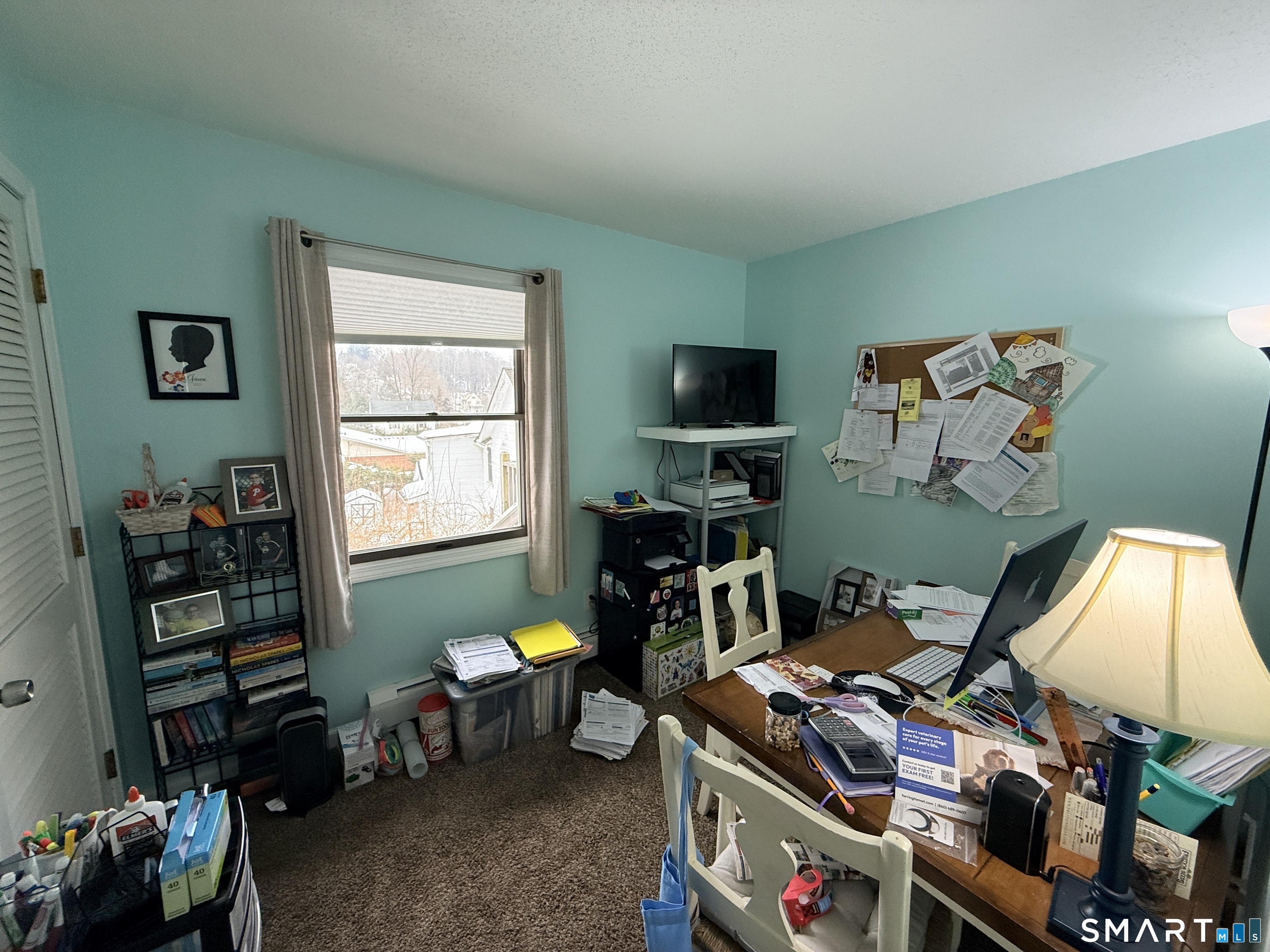 44 Lewis Street Winchester, CT 06098 - Photo 20 of 25 a room with furniture and a window