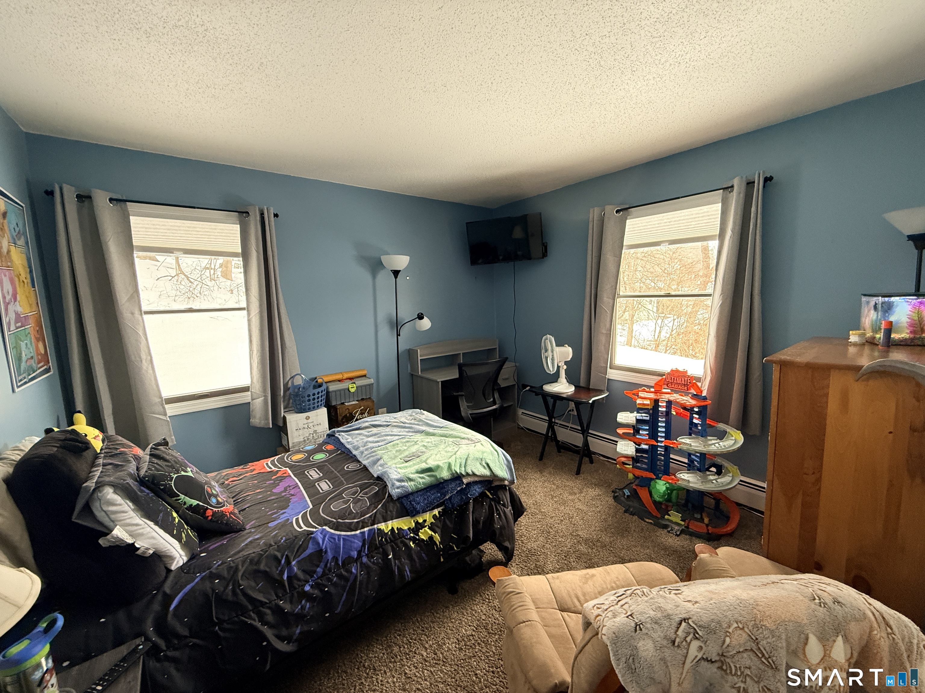 44 Lewis Street Winchester, CT 06098 - Photo 22 of 25 a bedroom with bed and a window