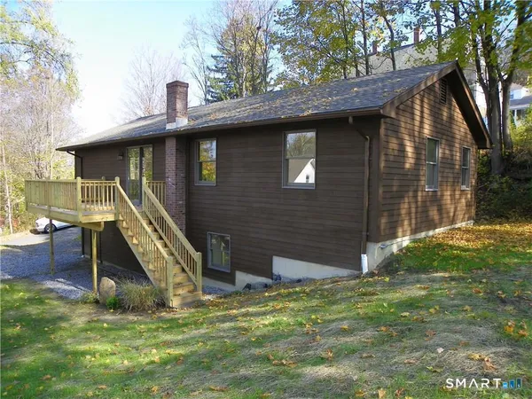 a view of a backyard with a cabin