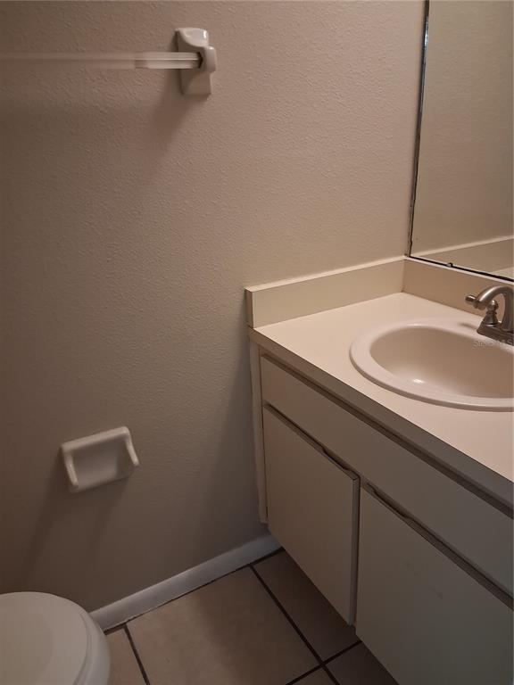 6710 121st Avenue, Unit 10 Largo, FL 33773 - Photo 16 of 17 a bathroom with a sink and vanity